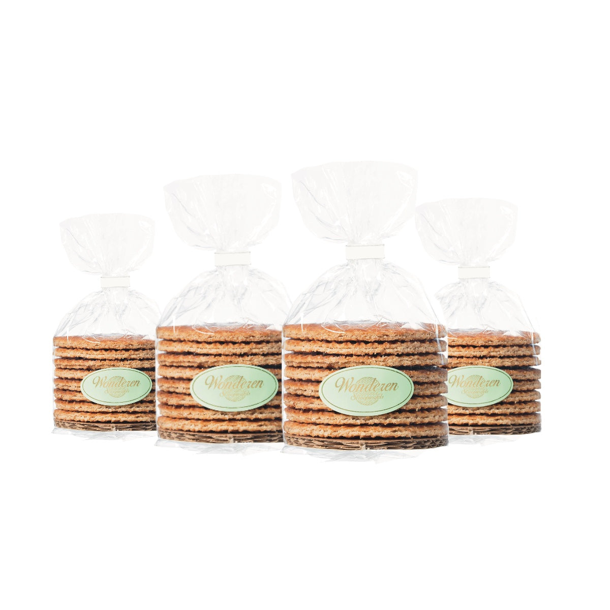 Four Wonderen Stroopwafels in plastic bags on a white background.