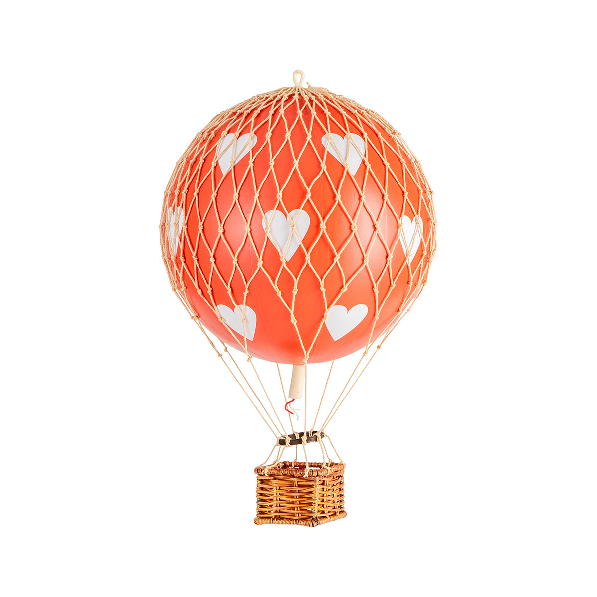 A quirky Wonderen Small Hot Air Balloon - Travels Light adorned with hearts, floating gracefully through the sky.