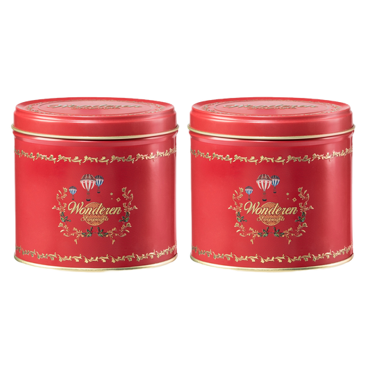 Two Double Authentic Red Stroopwafel Tin Cans with red ribbons on them.